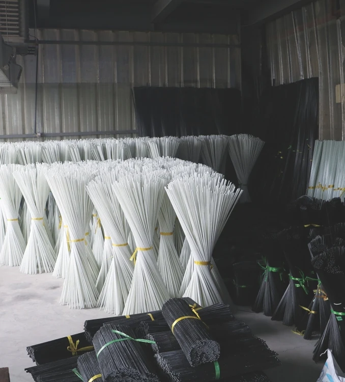 Bundles of fiberglass rods stored at JINXIN